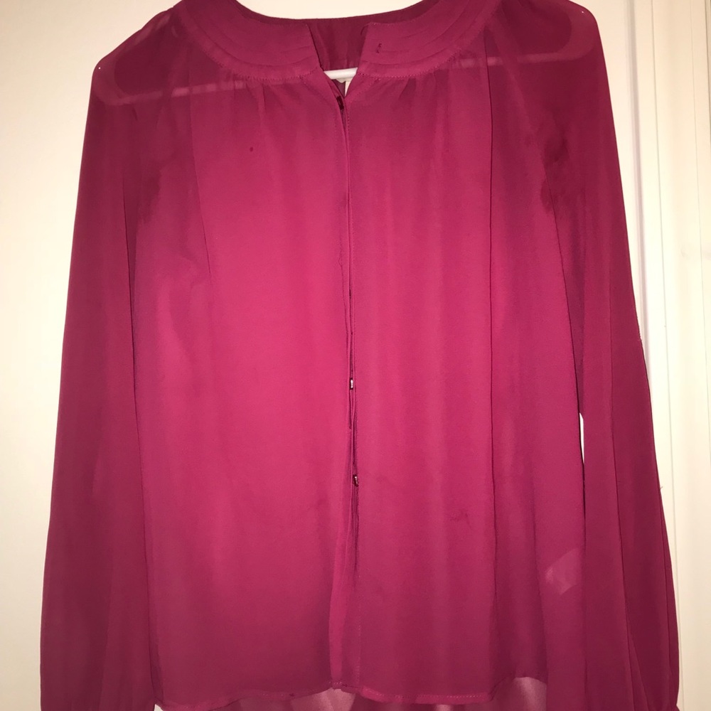 pink buttoned down blouse